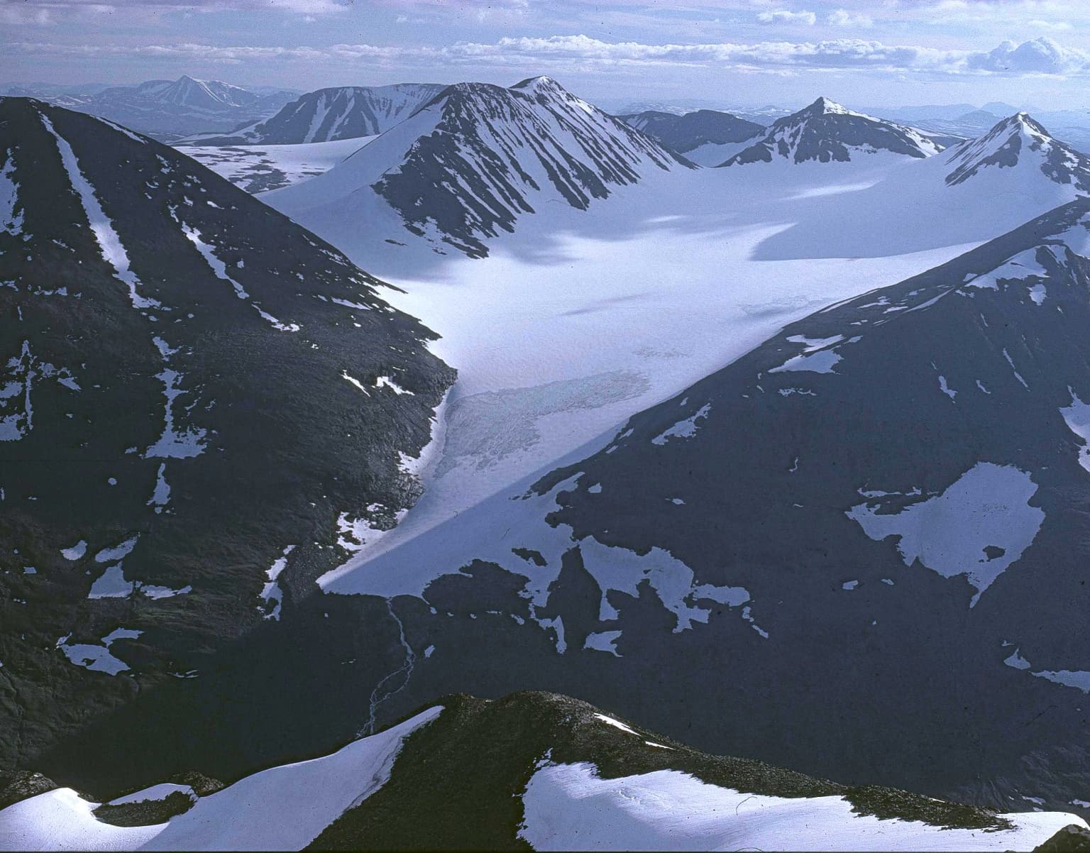 Snow-covered mountain peaks and glaciers in Sarek National Park, Sweden