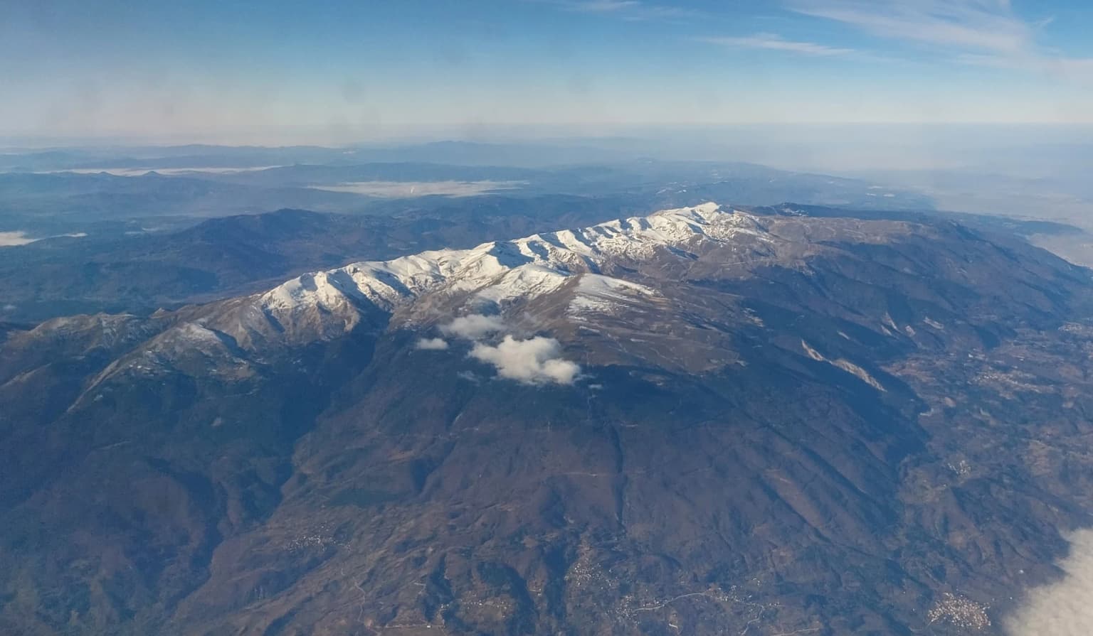 Aerial view of Uludağ National Park showing mountain peaks, valleys, and the city of Bursa