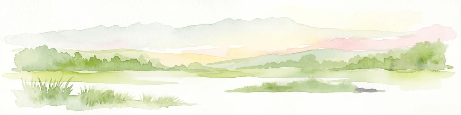 Watercolor painting showing mountains in the distance, a body of water, and green vegetation in the foreground