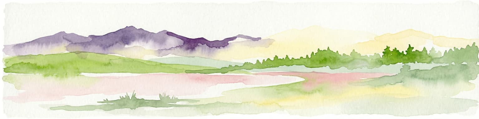 Watercolor painting showing a mountain range with green hills, a lake, and trees in the foreground