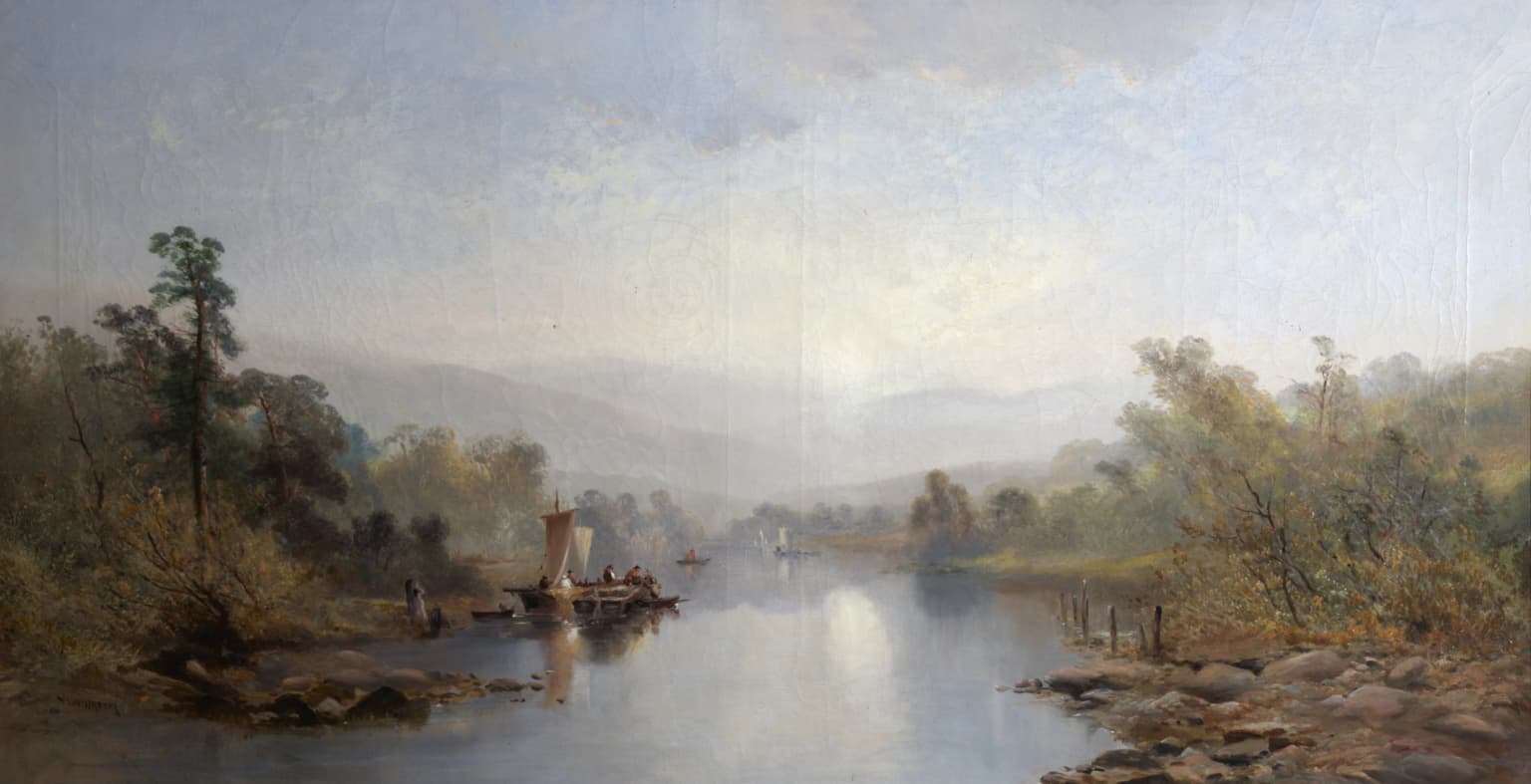 River scene with boat, trees, and distant moorland hills in Dartmoor National Park