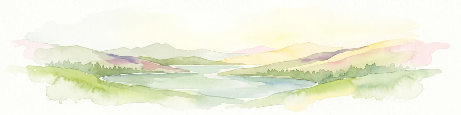 Watercolor painting showing a lake surrounded by mountains and green hills under a soft pastel sky