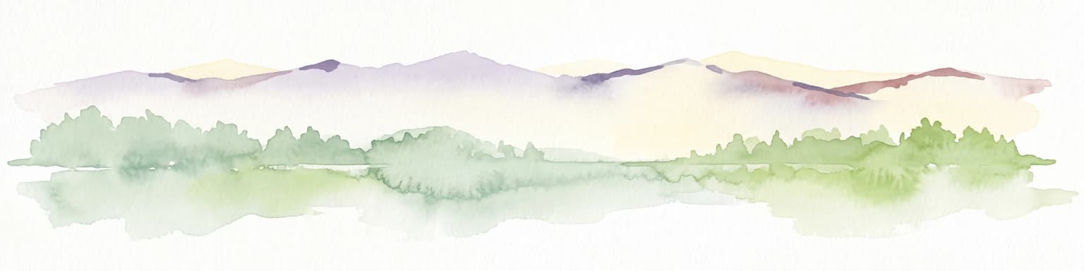 Watercolor painting of a soft, hazy forest landscape with rolling hills in the background and soft green trees in the foreground.