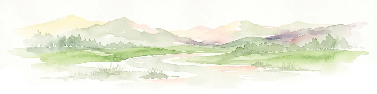 A soft, horizontal watercolor painting depicting a winding river through a grassy valley with distant, rolling mountains under a light sky.