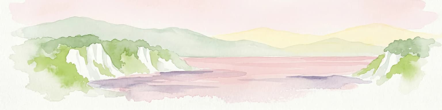 Watercolor painting showing chalk cliffs along a coastline with calm water and distant hills