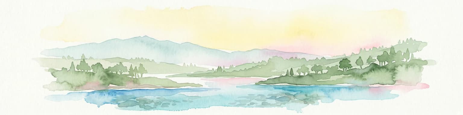 Watercolor scene featuring a blue lake, green trees, and mountains under a yellow-pink sky
