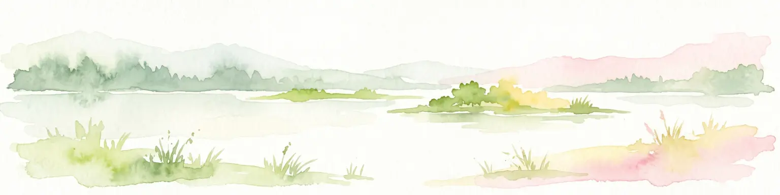 Watercolor painting of a calm lake with grassy foreground, small islands, and distant hills under a soft light.