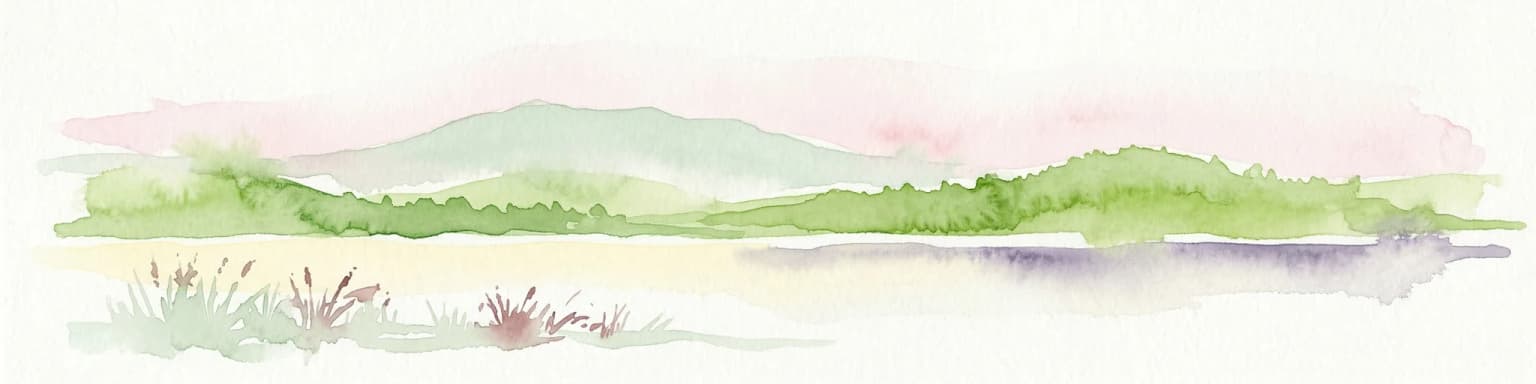 Watercolor illustration of a landscape with green hills, a body of water, and grassy foreground under a pink-hued sky