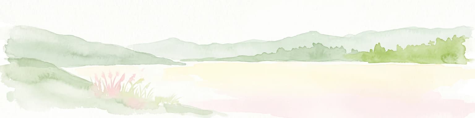 Watercolor painting of a calm lake surrounded by rolling hills and soft greenery.