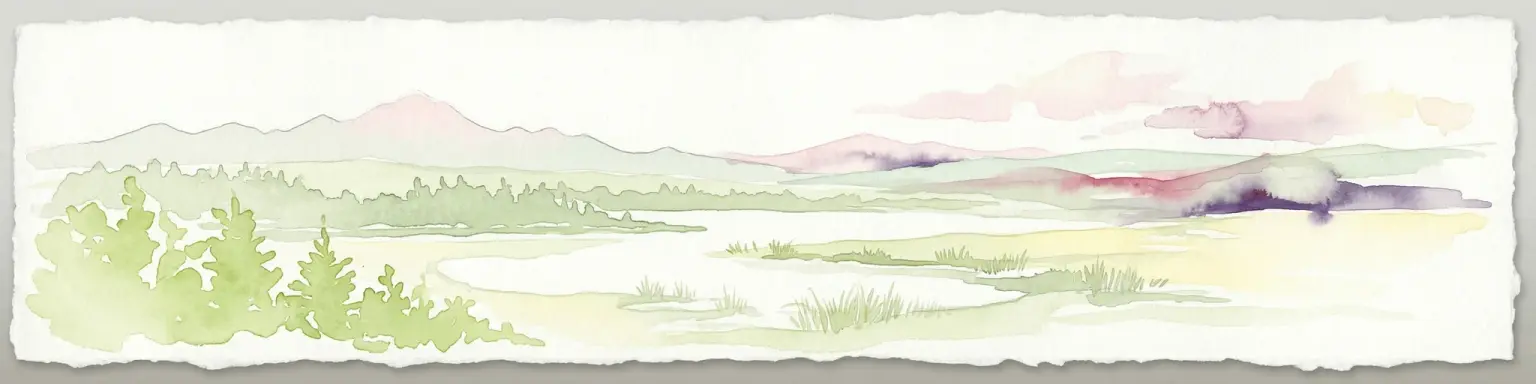 Watercolor painting of a lake surrounded by forest with mountains in the background