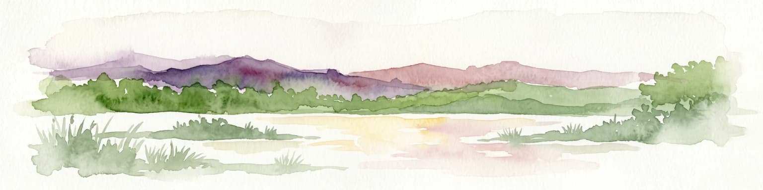 Watercolor painting of a lagoon surrounded by green vegetation and mountains in the background