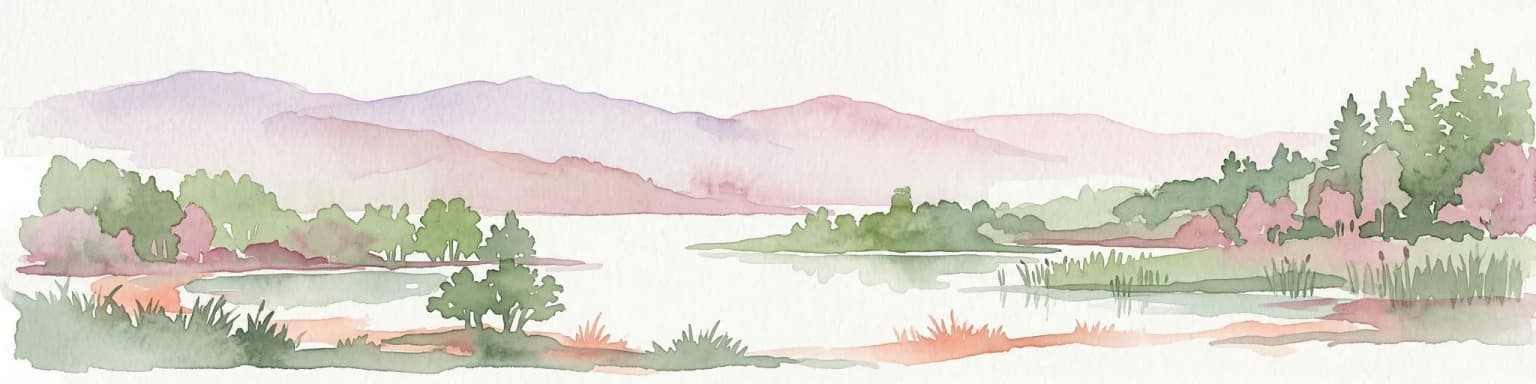 Watercolor painting showing a lake, mountains, trees, and grassy shoreline