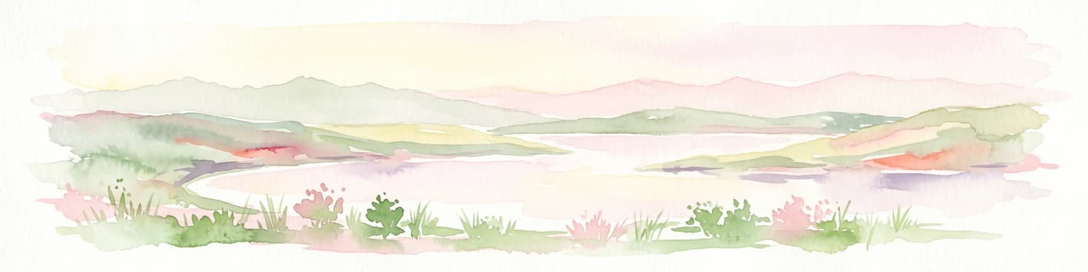 Watercolor painting of a serene landscape showing rolling green hills and a lake or pond under a soft light.