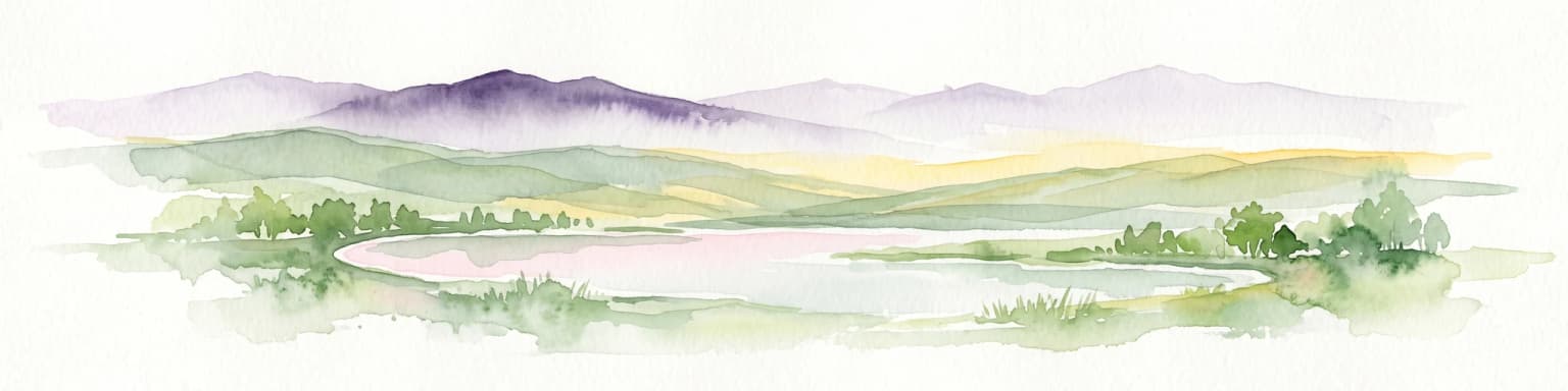 A horizontal watercolor painting depicting a soft-toned landscape with a foreground pond, grassy banks with sparse trees, and hazy, layered hills in the background.