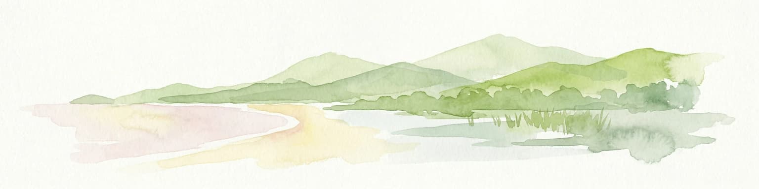 Watercolor illustration of a sandy beach with calm water and mountainous landscape in the background
