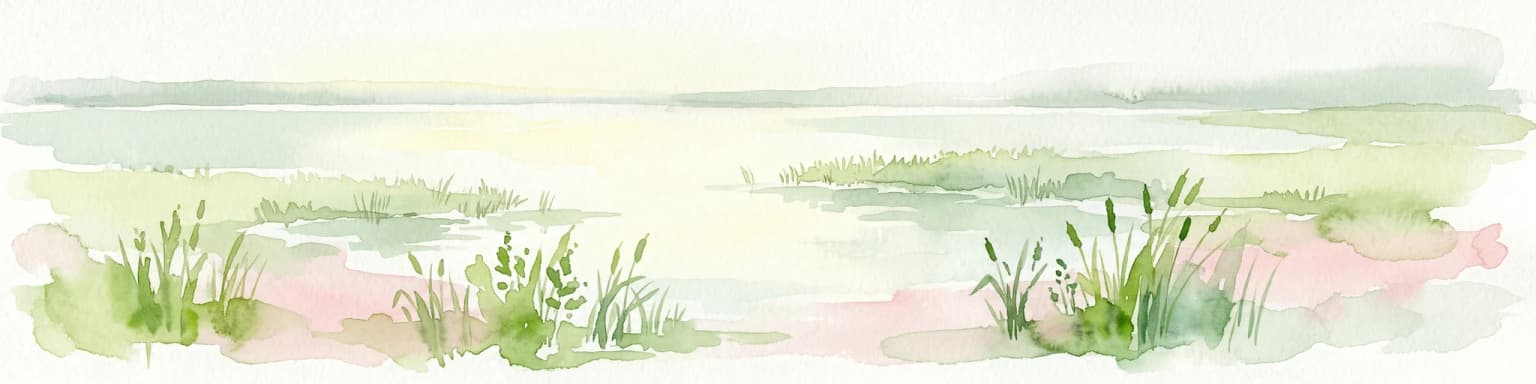 Watercolor painting showing a lake with grasses in the foreground and distant shoreline