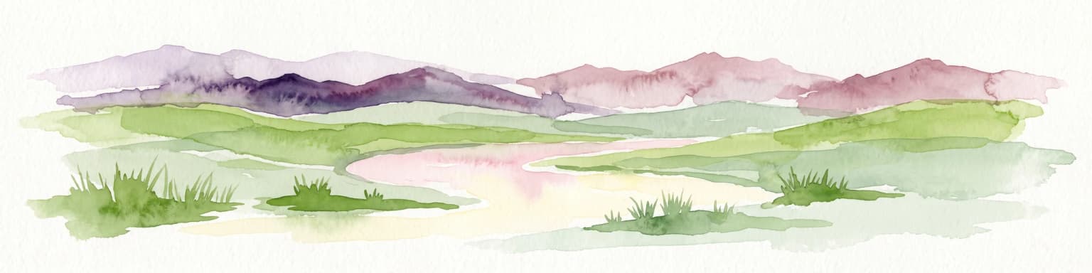 A horizontal watercolor painting showing a range of purple and reddish-toned mountains in the distance, behind rolling green fields and a pale pinkish waterway in the foreground.