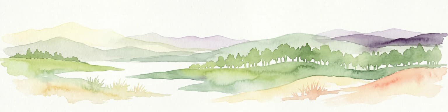 Watercolor painting showing green hills, a lake, and distant mountains under a light sky