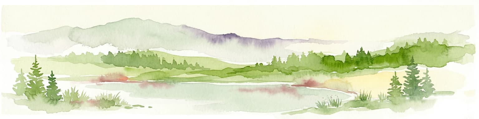 Watercolor painting showing a lake surrounded by mountains and forests