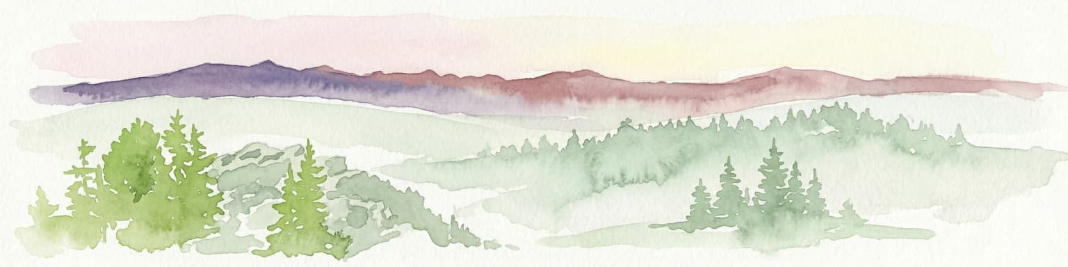 Watercolor painting showing green forested hills and distant purple mountains under a pale sky
