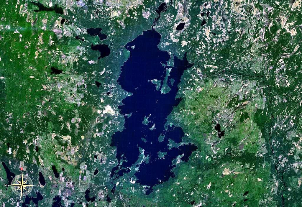 Satellite image showing Lake Vodlozero surrounded by forested land and smaller lakes