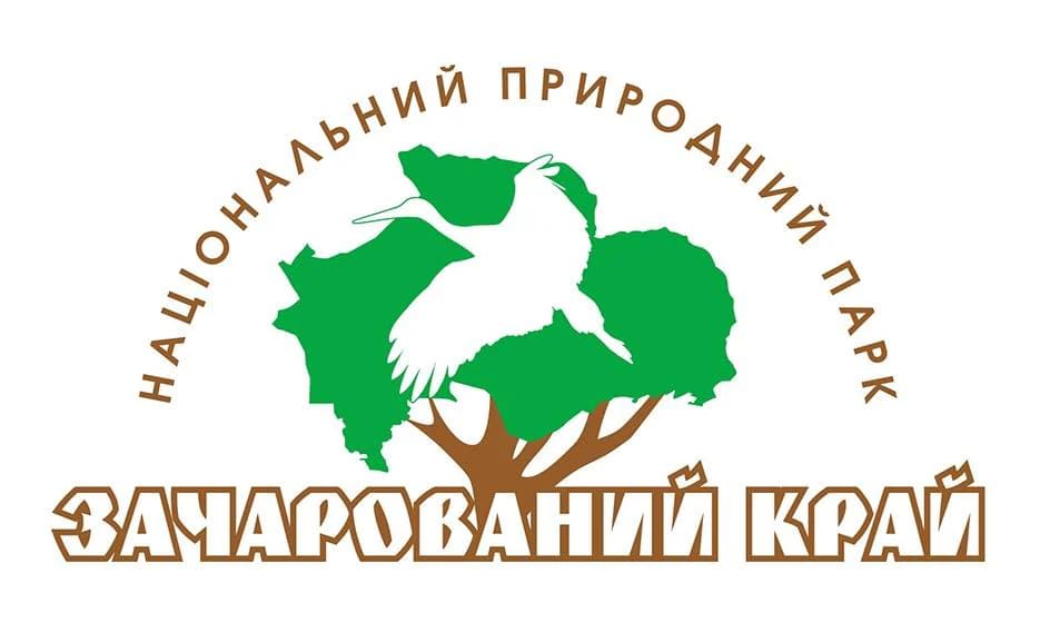 Green map outline of Ukraine with a white crane and tree, surrounded by text in Ukrainian and Russian reading 'National Nature Park' and 'Zacharovanyi Krai'